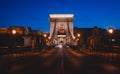 Night view of a famous Budapest Szechenyi Chain Bridge, a suspension bridge that spans the River Danube between Buda and Pest, the Royalty Free Stock Photo