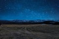 Night view of the field with mountains on the starry sky fotne Murmansk Russia