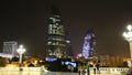 Night view of the Flame Towers. Projecting video on a skyscraper. The Republic of