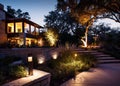 Night View Of Flowerbed Illuminated By Energy-Saving Solar Powered Lantern On Courtyard. Beautiful Small Garden Light Royalty Free Stock Photo