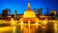 The night view on fountain on Piazza Castello with Sforza\'s Castle on background, Milan, Italy Royalty Free Stock Photo