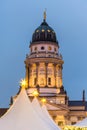 Night view of French Cathedral and Christmas market in the Gendarmenmarkt Berlin, Germany, the church erected for French Huguenots Royalty Free Stock Photo