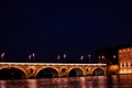 Night view of Garonne river with Pont Neuf bridge Royalty Free Stock Photo