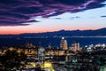 Night view of Genoa city center, buildings, skyscrapers and sea in Genoa, Italy Royalty Free Stock Photo