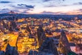 Night view of Goreme town with cave hotel built in rock formation in national park Goreme, Cappadocia, Turkey Royalty Free Stock Photo