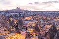 Night view of Goreme town with cave hotel built in rock formation in national park Goreme, Cappadocia, Turkey Royalty Free Stock Photo