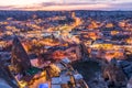 Night view of Goreme town with cave hotel built in rock formation in national park Goreme, Cappadocia, Turkey