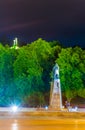 Night view of the Grand Duke Gediminas statue seen on Katedros Square in Vilnius with the three crosses hill behind it Royalty Free Stock Photo