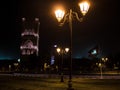 Night view on Hassan tower from the square with lanterns and Flags in Rabat, Morocco. Unfinished mosque minaret Royalty Free Stock Photo