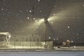 Night view of a heavy snowfall at train station Royalty Free Stock Photo