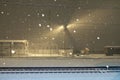 Night view of a heavy snowfall at train station Royalty Free Stock Photo
