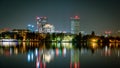 Night view from Herastrau Park to office and residential buildings from North of the Bucharest city Royalty Free Stock Photo