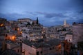 Night view of the houses and illuminated streets of Sasso Barisano, district of Matera, European Capital of Culture 2019