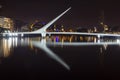 Night view of iconic landmark city of Buenos Aires El Puente de La Mujer, or Woman`s Bridge.Puerto Madero Buenos Aires Argentina