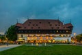 Night view of the iiluminated building of the Konzil of Konstanz in Germany. (sign says Konzil restaurant in