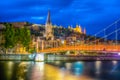 Night view of illuminated basilique de Notre-dame de Fourivere and Saint Georges church in Lyon, France Royalty Free Stock Photo