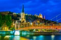 Night view of illuminated basilique de Notre-dame de Fourivere and Saint Georges church in Lyon, France Royalty Free Stock Photo