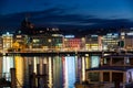 Night view of illuminated Geneva cityscape seen from lake