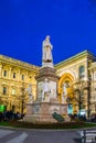 night view of the illuminated statue of leonardo da vinci in the italian city milano....IMAGE Royalty Free Stock Photo