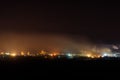 Night view of industrial district of city and smoke pipes of factory Royalty Free Stock Photo