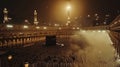 night view of kaaba in makkah with crowd of muslim people