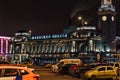 Night view on the Kievsky railway terminal station. Public Car parking near Kievsky station in Moscow