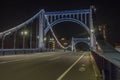 Night view of the Kiyosuhashi Bridge over the Sumidagawa river, with tall buildings behind, Tokyo