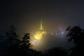 Night view of kyaiktiyo pagoda or Golden Rock with fog background are pagoda is famous tourist attraction in Mon state, Myanmar Royalty Free Stock Photo