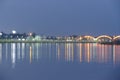 Night view of the lake and the bridge across the river Royalty Free Stock Photo