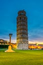 Night view of the leaning tower of Pisa and statue of romulus and remus...IMAGE Royalty Free Stock Photo