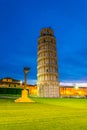 Night view of the leaning tower of Pisa and statue of romulus and remus...IMAGE Royalty Free Stock Photo