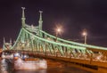 Night view of Liberty Bridge or Freedom Bridge in Budapest, Hungary Royalty Free Stock Photo