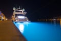 Night view of Mali LoÃÂ¡inj harbor and marina in medieval old town Mali LoÃÂ¡inj. Mooring luxury yachts, boats and other vessels on