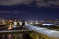 Night view of the Manzanares river in Madrid with the old bridge Royalty Free Stock Photo