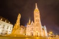 Night view of the Matthias Church and Statue of Holy Trinity, Budapest, Hungary. Royalty Free Stock Photo