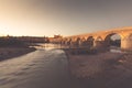 Night view of Mezquita-Catedral and Puente Romano - Mosque-Cathedral and the Roman Bridge in Cordoba, Andalusia, Spain Royalty Free Stock Photo