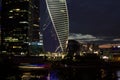 Night view of the modern architectural complex of Moscow city with multicolored illumination Russia