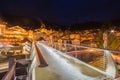 Night view of modern bridge to mountain village Royalty Free Stock Photo