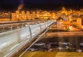 Night view of modern bridge to mountain village Royalty Free Stock Photo