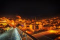 Night view of modern bridge to mountain village Royalty Free Stock Photo