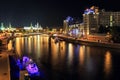 Night view of the Moskva-River with the Moscow Kremlin and the Variety Theatre. Moscow, Russia.