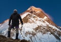 Night view of Mount Everest with climber