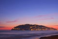 night view of the mountain the Alanya, Turkey. blue Mediterranean sea, pink sunset, mountain of Alanya shines night lights