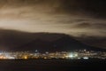 Night view of Naples with Vesuvius volcano silhouette, Campania, Royalty Free Stock Photo