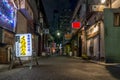 Night view of a narrow street of the Golden Gai, famous for its small bars and night clubs, Kabukicho, Shinjuku, Tokyo, Japan Royalty Free Stock Photo