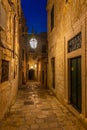 Night view of a narrow street in the historical center of Dubrovnik, Croatia Royalty Free Stock Photo