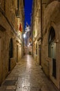 Night view of a narrow street in the historical center of Dubrovnik, Croatia Royalty Free Stock Photo