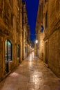 Night view of a narrow street in the historical center of Dubrovnik, Croatia Royalty Free Stock Photo