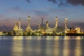 Night view oil refinery light water front