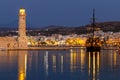 Night view, Old historic port in Rethymno town in Crete, lighthouse, Greece Royalty Free Stock Photo